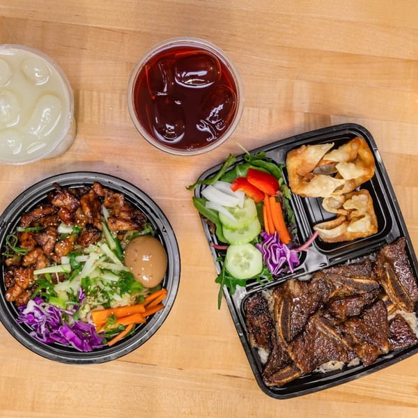 Tea Plus Poke meal with teriyaki chicken, short ribs, wontons, salad, and two drinks.